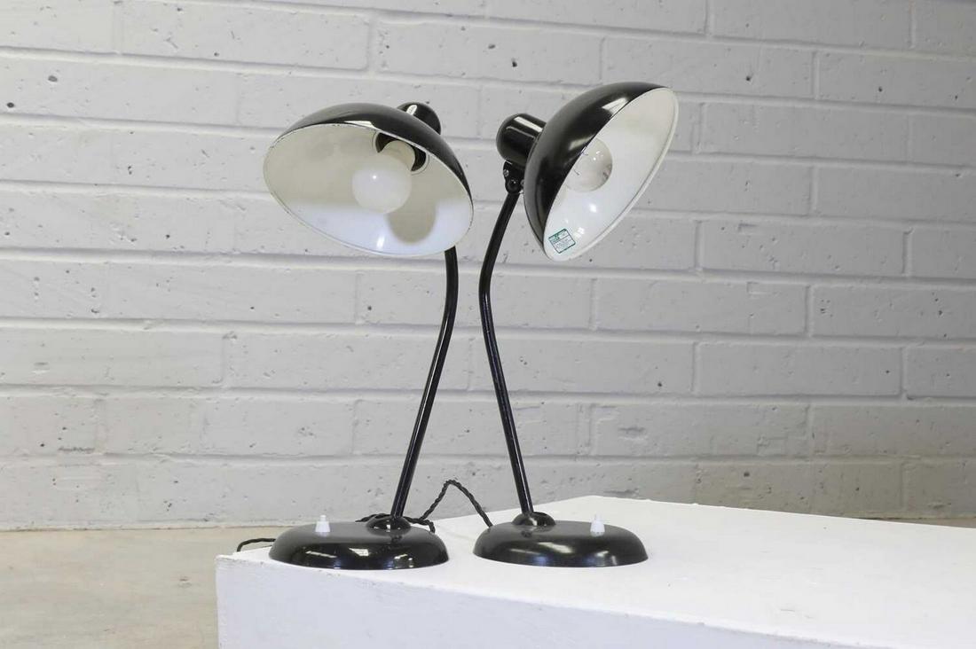 A pair of Kaiser Idell 'Model 6556' table lamps,: A pair of Kaiser Idell 'Model 6556' table lamps, A pair of Kaiser Idell 'Model 6556' table lamps, originally designed by Christian Dell in 1931 for Kaiser Leuchten, each domed shade raised on an angle