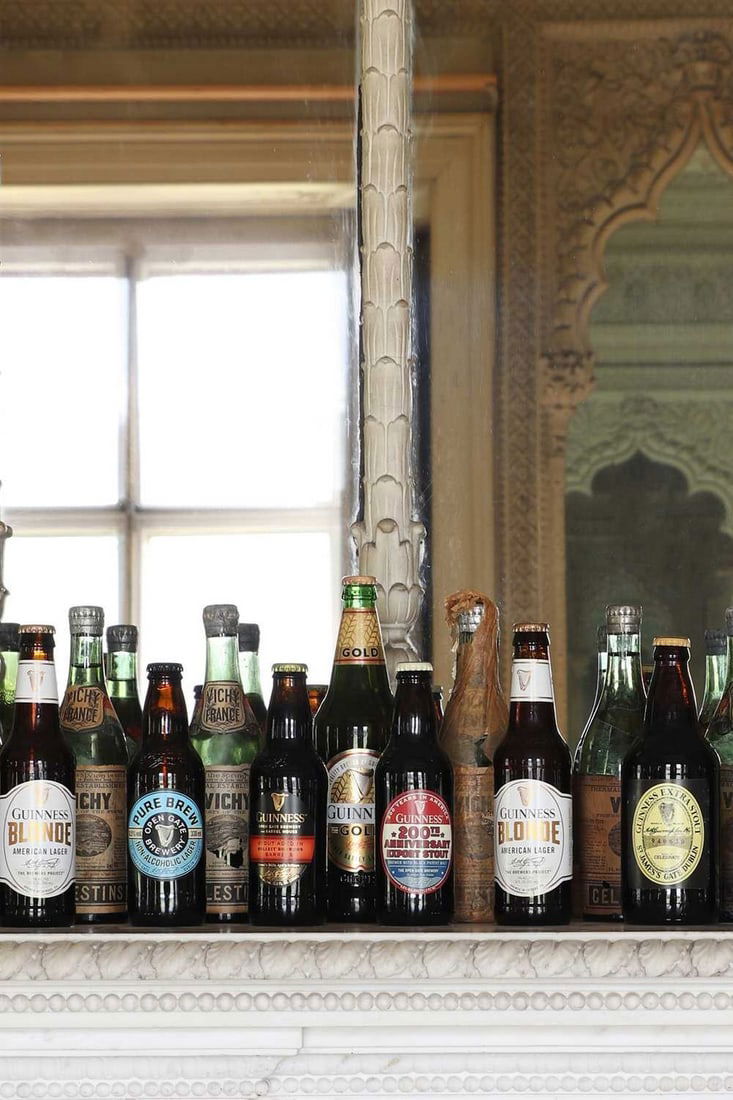 A collection of nine commemorative Guinness bottles, (1 of 14)