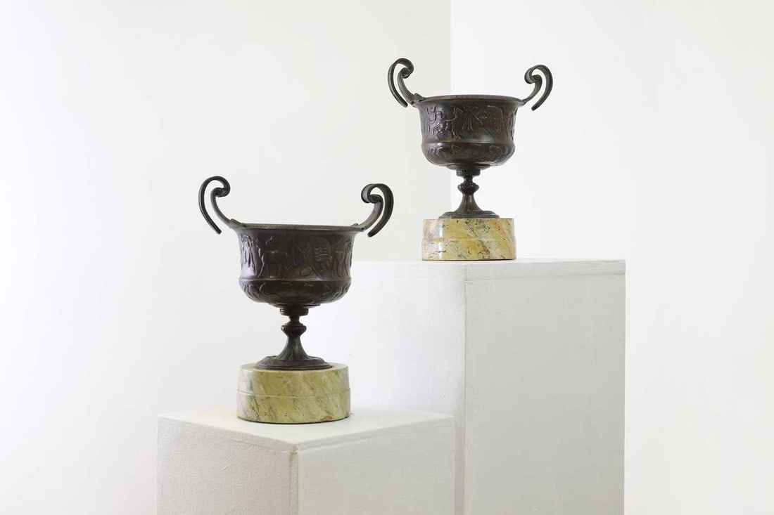 A pair of grand tour bronze urns, (1 of 9)
