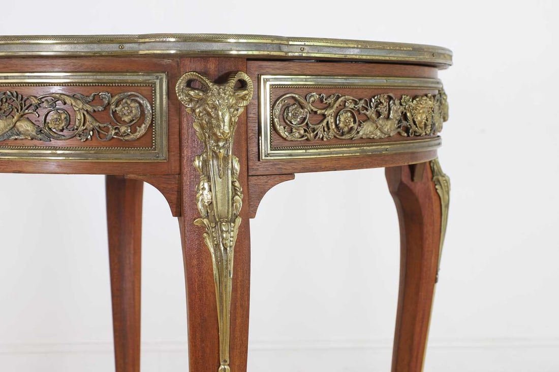 A Louis XV-style mahogany, ormolu and bois satiné parquetry centre table, (1 of 8)