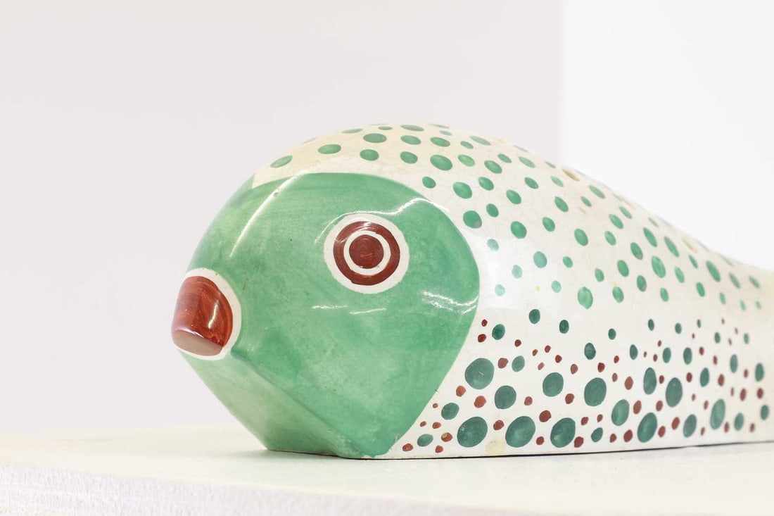 A glazed pottery fish, (1 of 12)