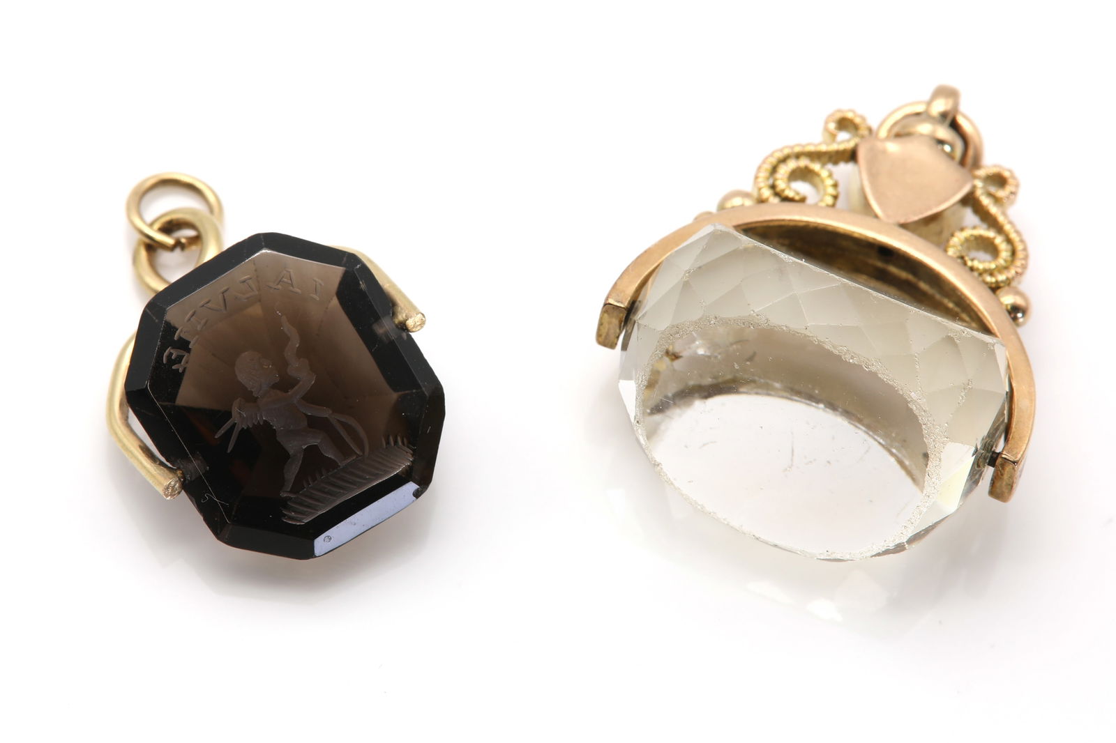An Edwardian 9ct gold faceted quartz swivel seal, by William Oakley Davies, (1 of 2)