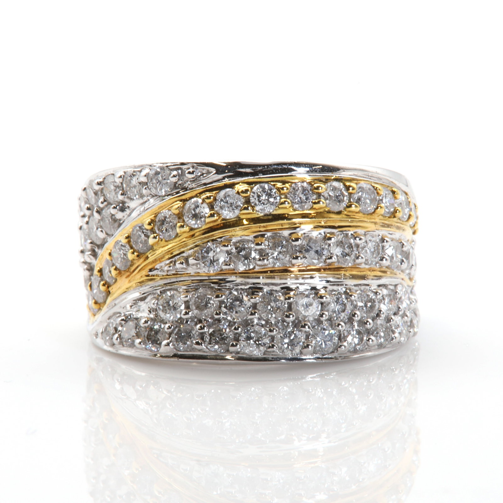 An 18ct white gold diamond set tapered band ring, (1 of 3)