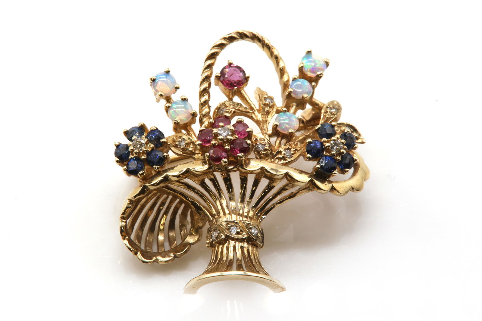 A 9ct gold diamond and gem set giardinetti brooch, (1 of 2)
