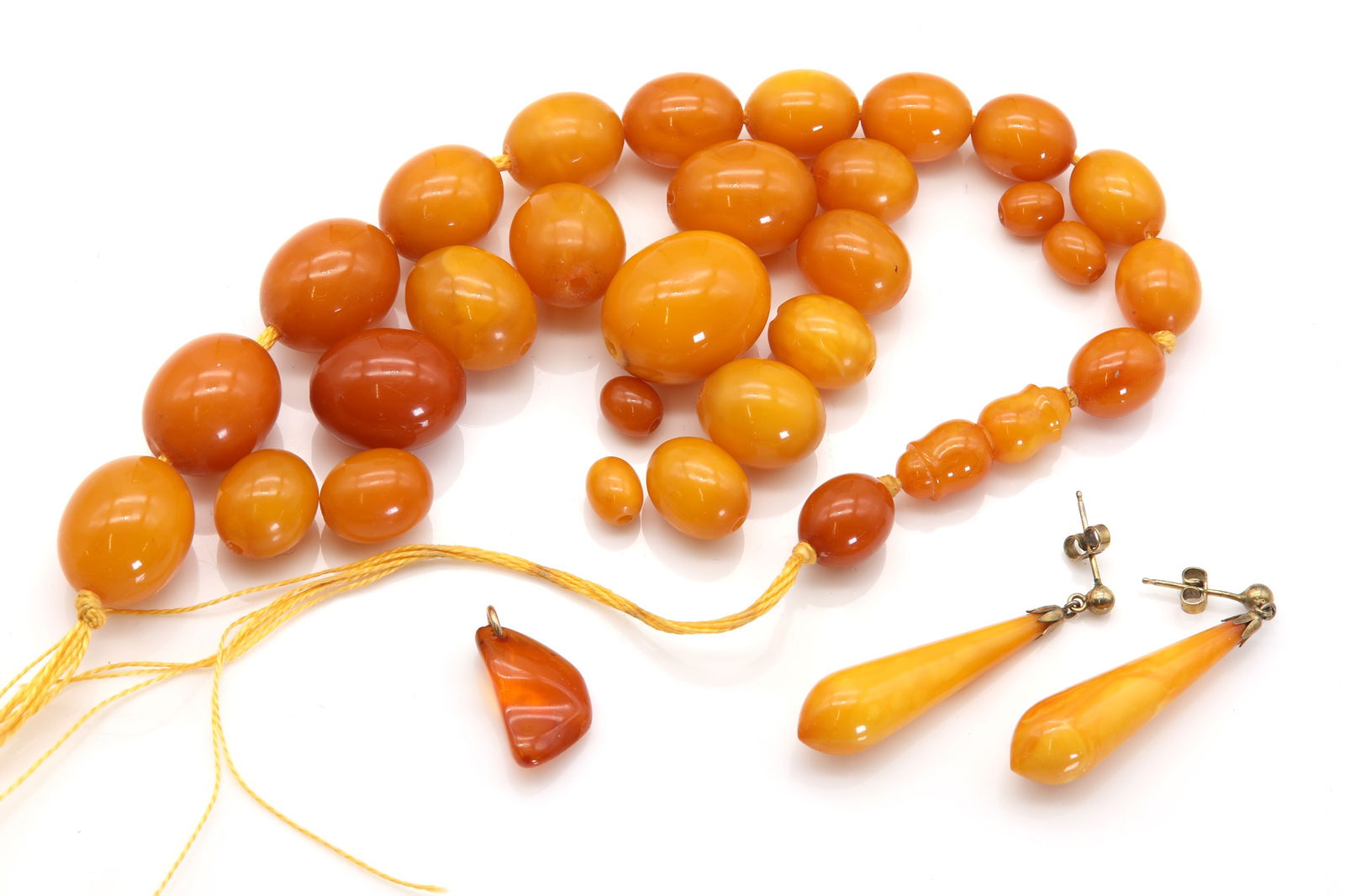 A group of butterscotch amber beads, (1 of 1)