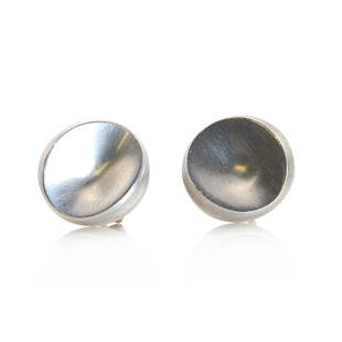 A pair of Danish Modernist sterling silver stud earrings, by Georg Jensen,: A pair of Danish Modernist sterling silver stud earrings, by Georg Jensen, A pair of Danish Modernist sterling silver stud earrings, by Georg Jensen, no. 136D, of circular concave form with post and b