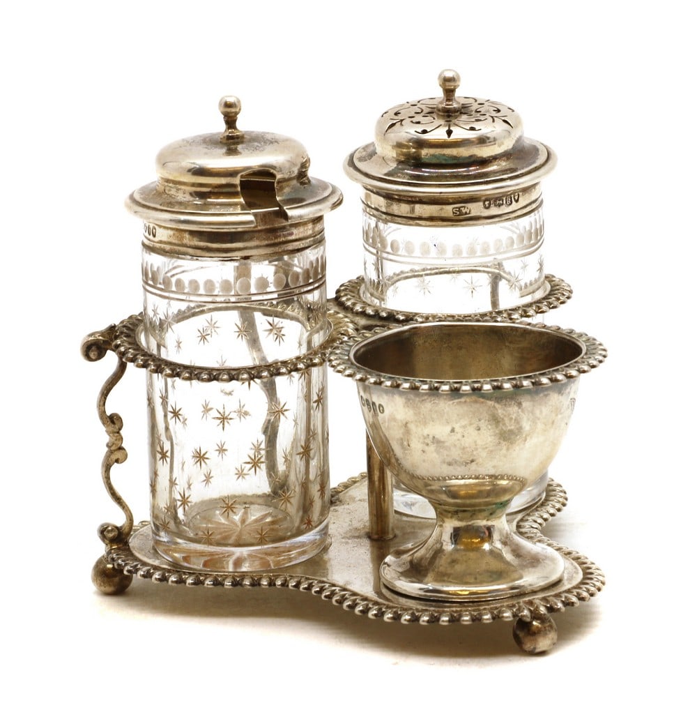 A Victorian silver and glass egg cruet (1 of 8)