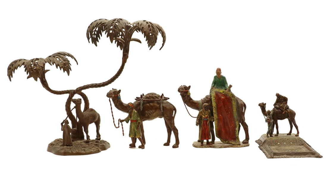 A group of four cold painted spelter figures, (1 of 15)