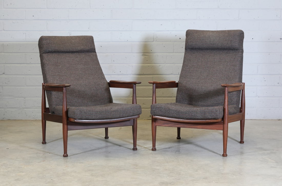 A pair of 'Manhattan' afrormosia lounge armchairs, (1 of 2)