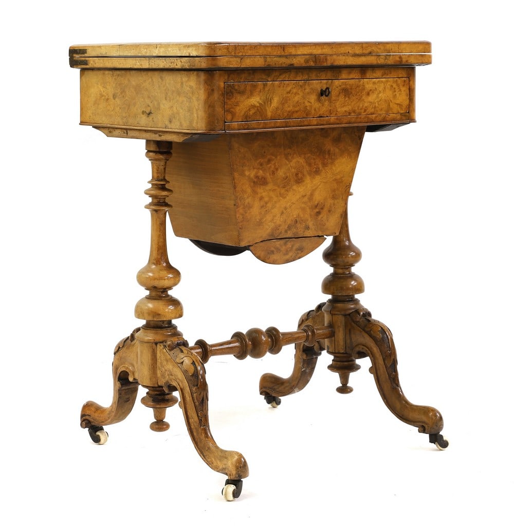 A Victorian figured walnut games work table (1 of 9)