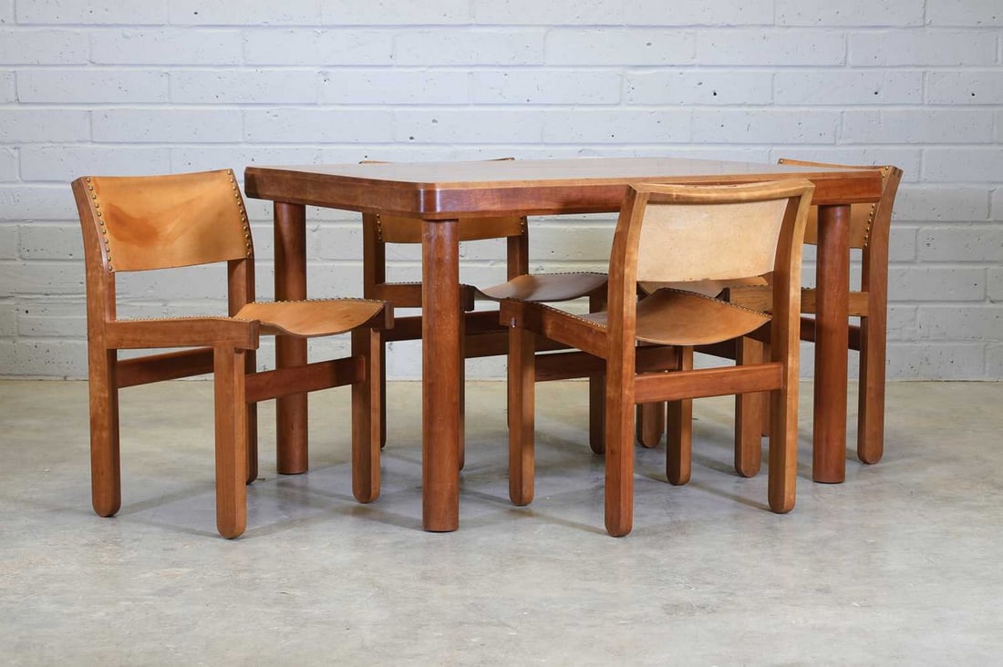 John Makepeace (b.1939): John Makepeace (b.1939) John Makepeace (b.1939), a cherrywood breakfast suite, dated 1982 and inscribed by maker Norman Illingworth, comprising: a dining table, the square top with rounded edges, rais