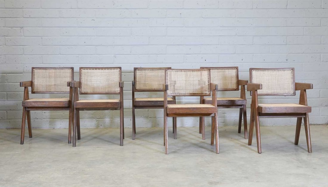 A matched set of six floating-back teak armchairs, (1 of 7)