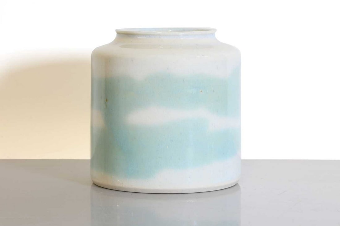 Brother Thomas Bezanson (Canadian, 1929-2007),: Brother Thomas Bezanson (Canadian, 1929-2007), Brother Thomas Bezanson (Canadian, 1929-2007), a pottery vase, c.1965-70, of cylindrical form, with a Clair-de-lune glaze, with a short neck, inscribed '