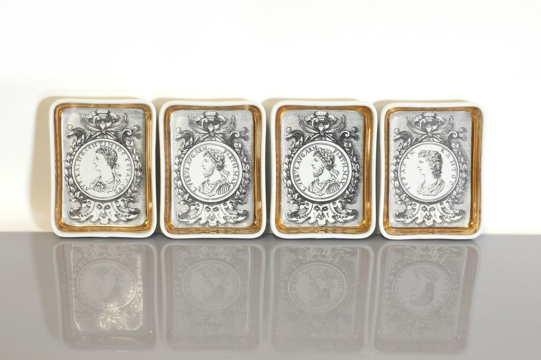 A set four Fornasetti 'Profili Romani' dishes, (1 of 3)