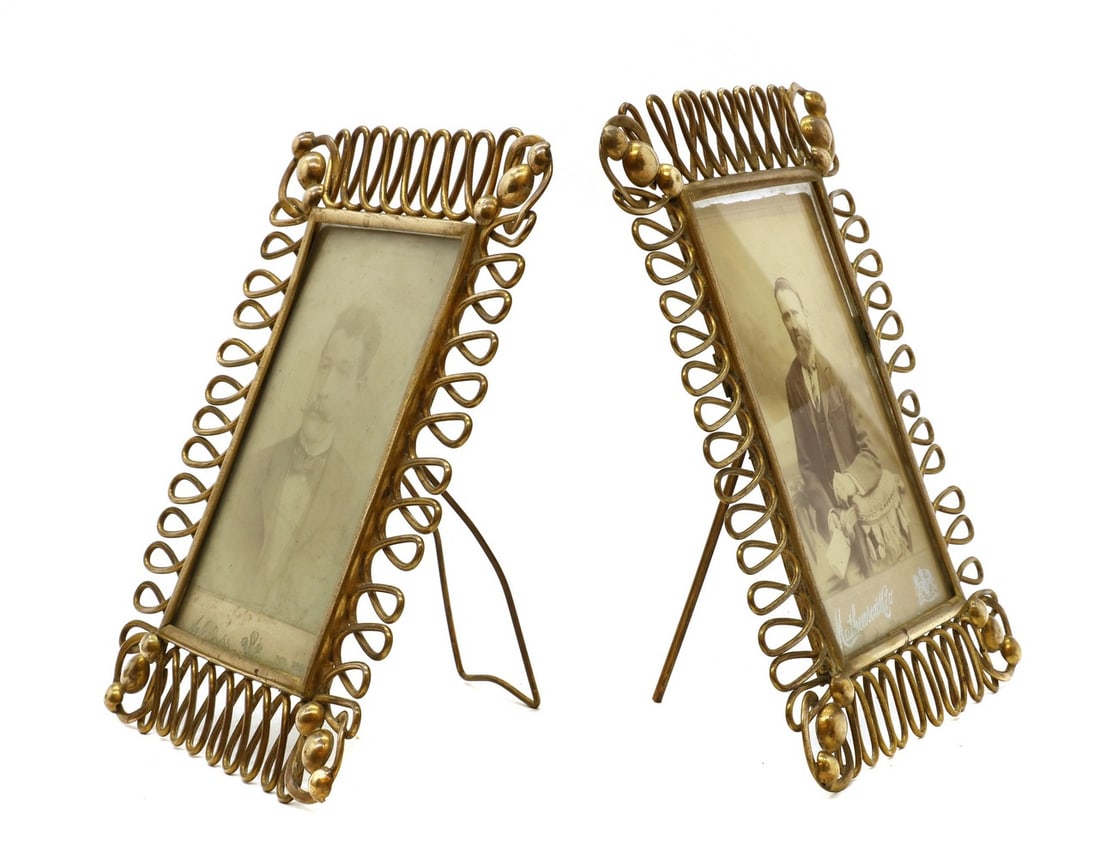 A pair of brass photograph frames, (1 of 2)