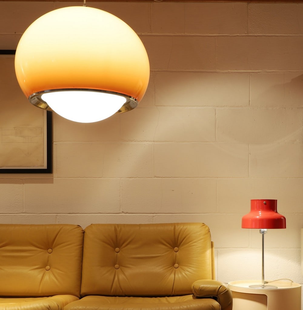 A Harvey Guzzini hanging light: A Harvey Guzzini hanging light A Harvey Guzzini hanging light, 1970s, labelled, 45cm diameter Provenance: The Estate of John Graham (1927-2021), Harlow. Condition Report: Working, with label. With plu