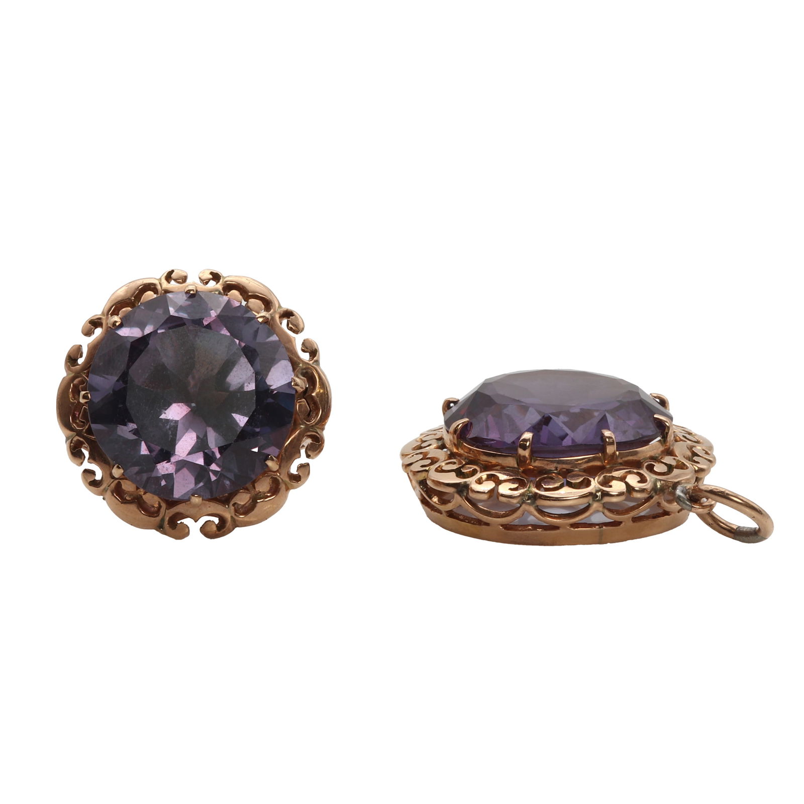 A rose gold synthetic colour change sapphire ring and pendants set,: A rose gold synthetic colour change sapphire ring and pendants set, A rose gold synthetic colour change sapphire ring and pendants set, the ring claw set with a circular mixed cut large synthetic colo