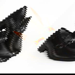 A pair of Gucci men's black leather loafers,: A pair of Gucci men's black leather loafers, A pair of Gucci men's black leather loafers, with classic techno-coloured canvas strap and gold tone horse bit buckle, with leather sole in orginal box, si