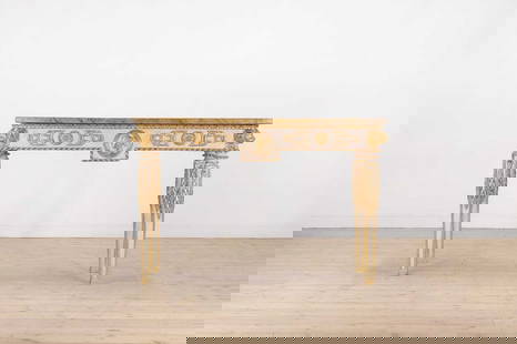A painted and parcel-gilt console table: A painted and parcel-gilt console table A painted and parcel-gilt console table, 20th century, in the neoclassical taste, the faux marble top above a frieze decorated with masks and floral bosses, rai