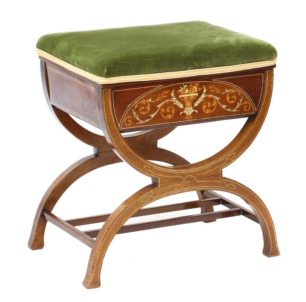 An Edwardian mahogany, boxwood and ivory inlaid stool: An Edwardian mahogany, boxwood and ivory inlaid stool, An Edwardian mahogany, boxwood and ivory inlaid stool, the hinged stuff-over seat opening to reveal a void interior, raised on X-frame, 47cm wide