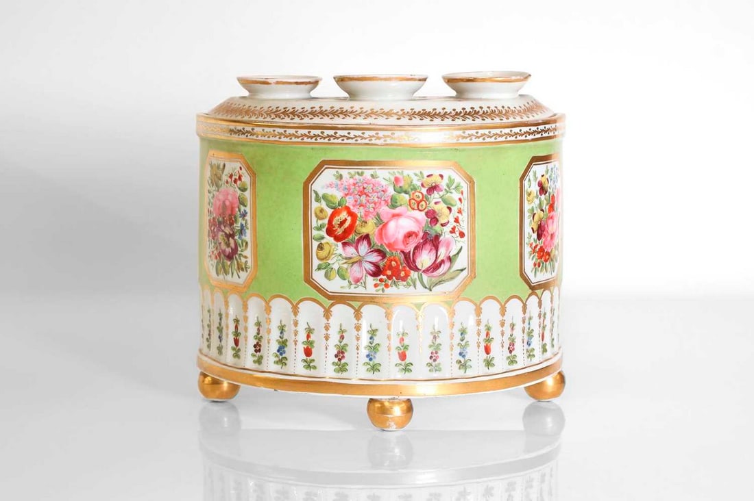 A porcelain bough pot and cover,: A porcelain bough pot and cover, A porcelain bough pot and cover, early 19th century, in the manner of William Billingsley, of semicircular section on three bun feet, the pot painted with three panels