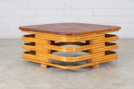 A bamboo and rattan 'Pretzel' coffee table,: A bamboo and rattan 'Pretzel' coffee table, 1950s, after the original design by Paul Frankl (Austrian/American, 1886-1958), with a square teak top over a latticed multistrand base, 89cm square 38cm hi