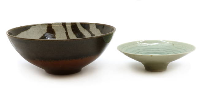 Peter Lane (born 1932): Peter Lane (born 1932) two pottery bowls, incised marks, comprising; a footed example, with a pale blue glaze, 21cm diameter, and a larger example, the interior with a black and white striped pattern