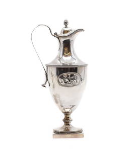 A George III silver ewer and cover,: A George III silver ewer and cover, by Andrew Fogelberg and Stephen Gilbert, London 1784, of plain urn form, with beadwork borders, with applied oval cartouches of putti, on a square plinth, 31cm