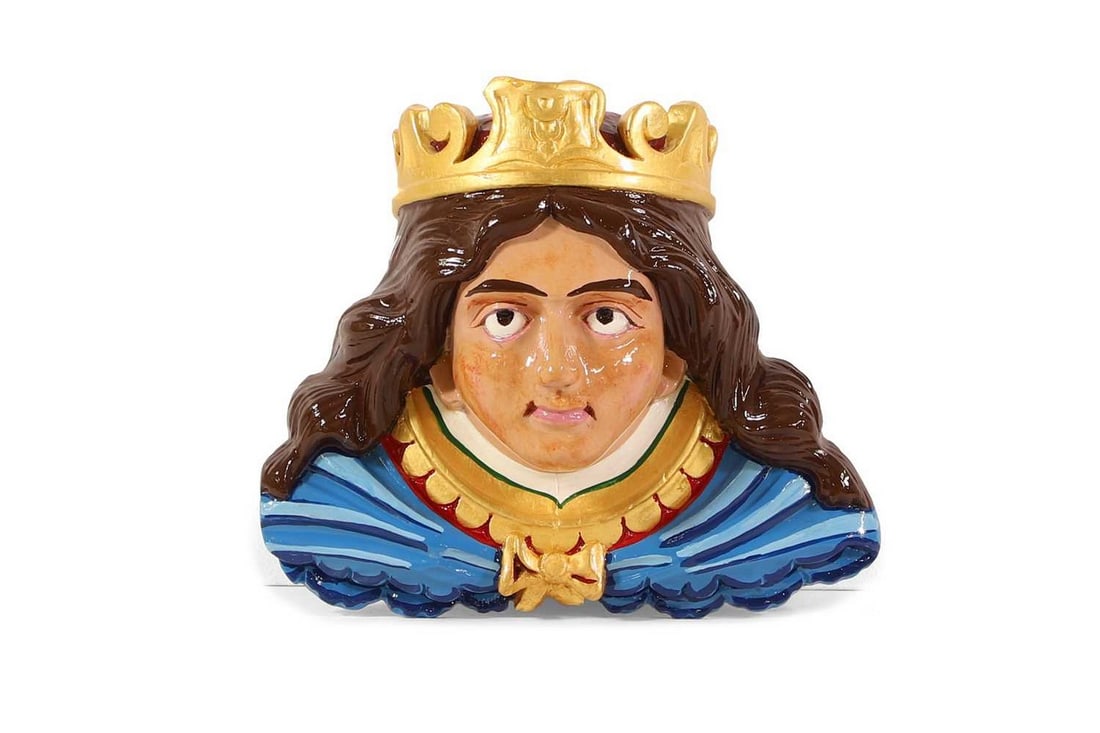 A carved wooden fairground carousel figural boss by F Savage & Co., (1 of 4)