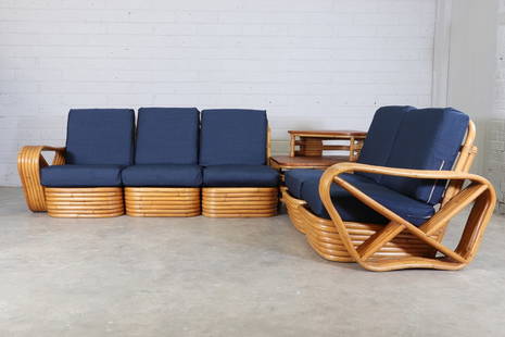 A bamboo and rattan 'Pretzel' modular sofa,: A bamboo and rattan 'Pretzel' modular sofa, 1950s, after the original design by Paul Frankl (Austrian-American, 1886-1958), of six-strand construction, in five sections, each with seat and back cushio