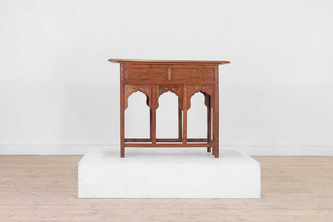 A teak and brass occasional table, (1 of 10)