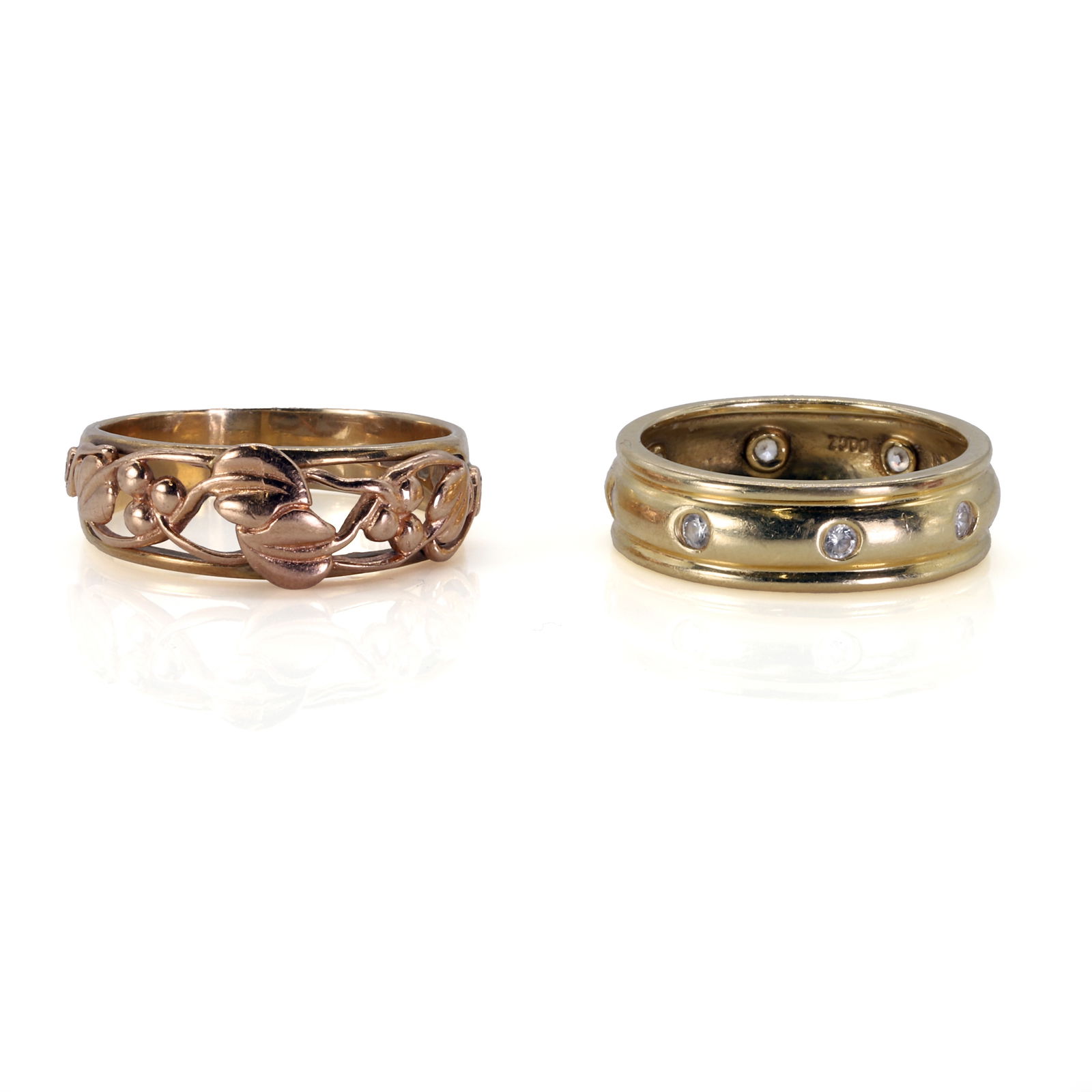 Two gold band rings, (1 of 3)
