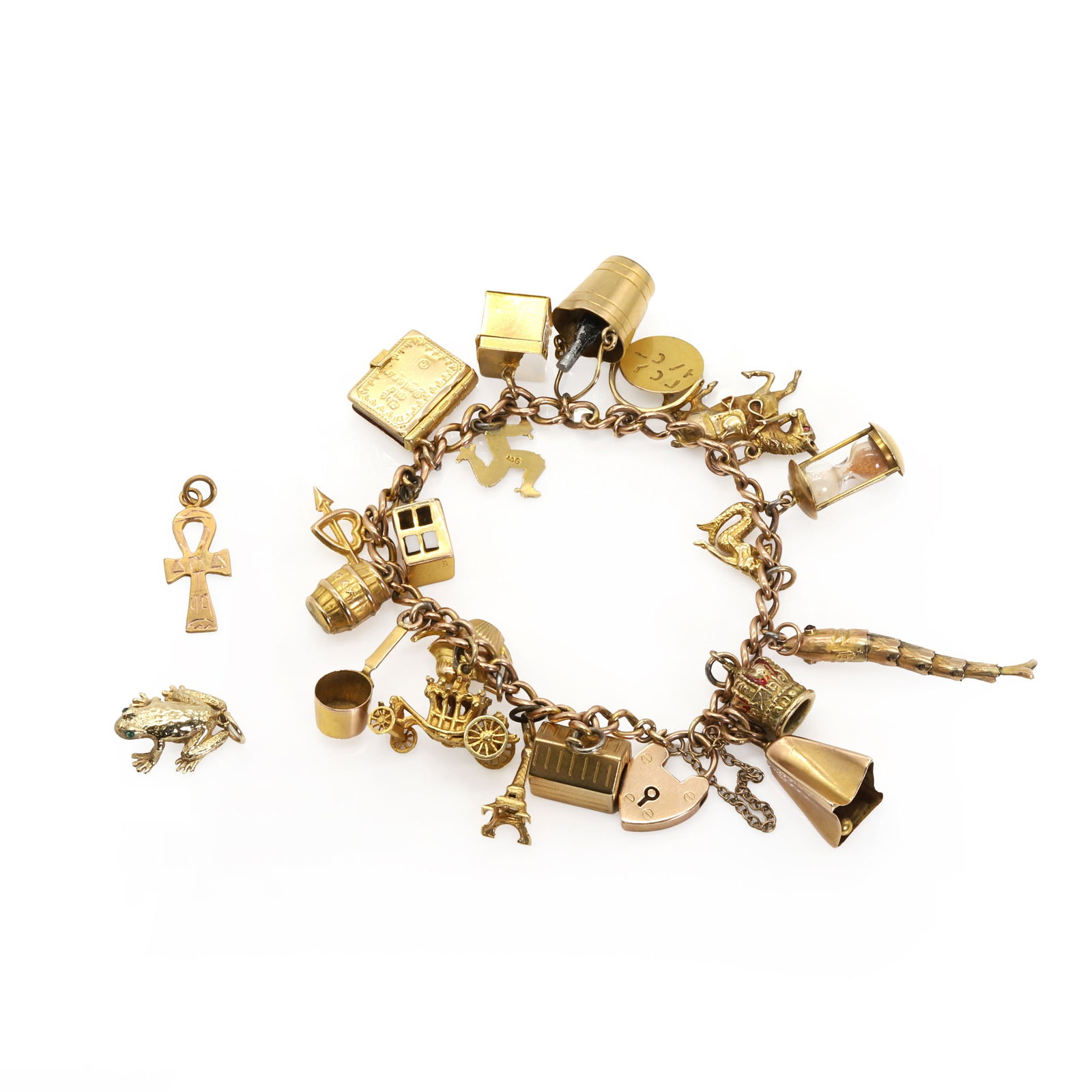 A gold charm bracelet, (1 of 1)