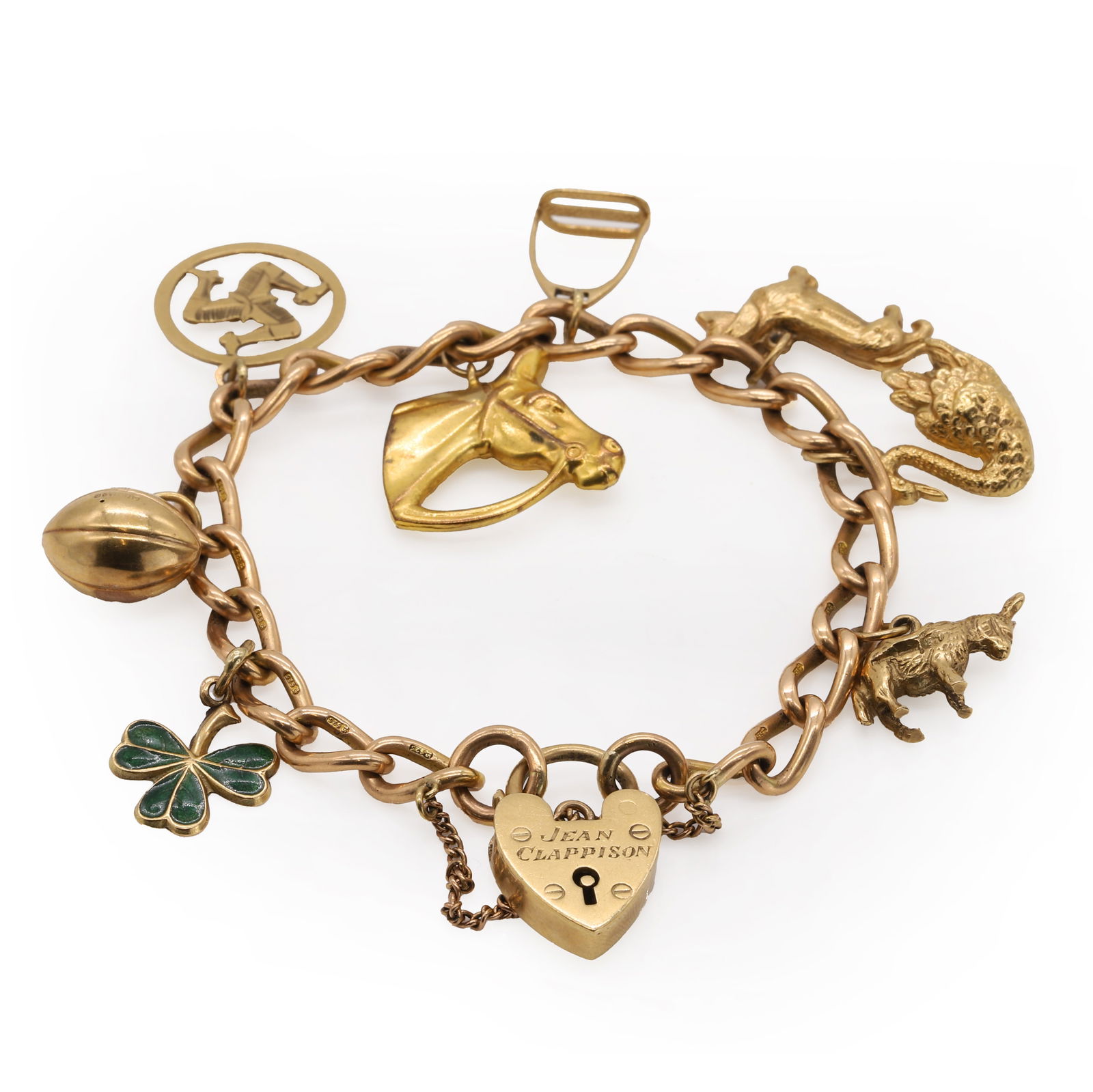 A gold charm bracelet, (1 of 1)