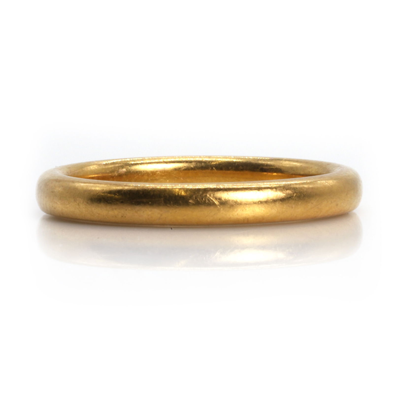A 22ct gold wedding ring, (1 of 2)