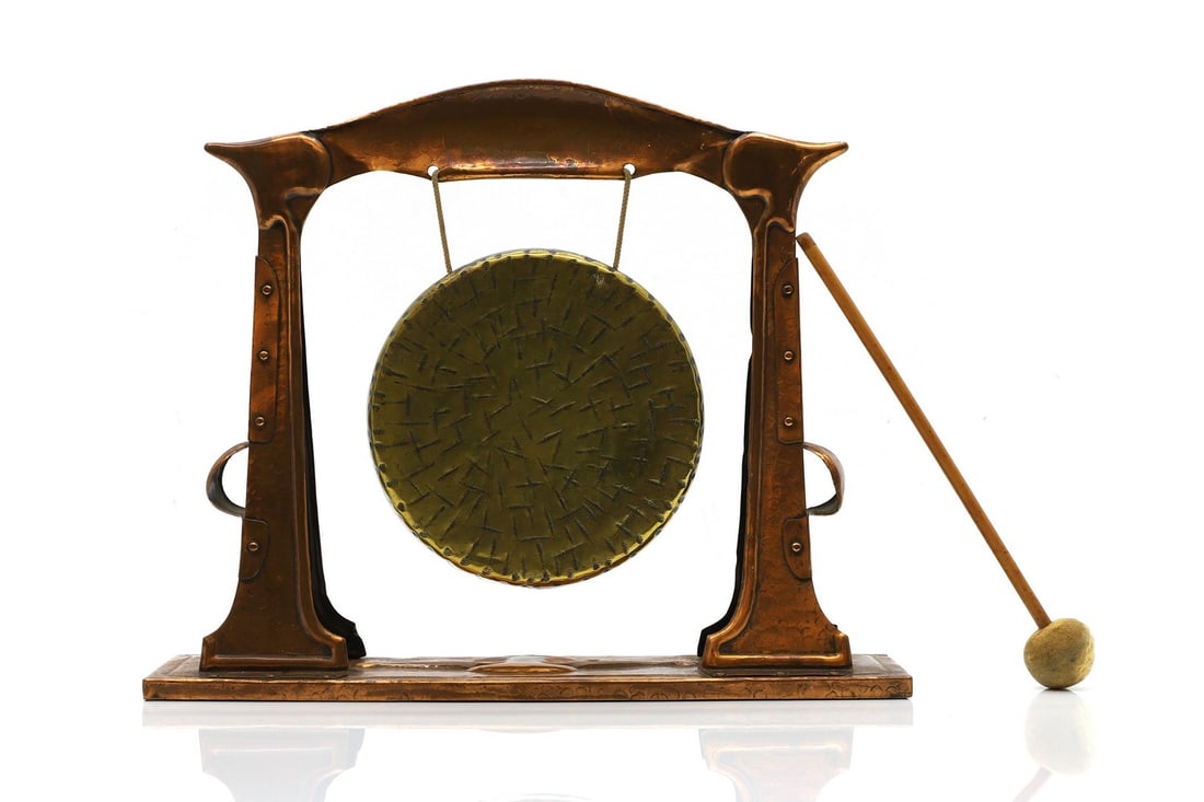 An Art Nouveau planished copper and brass dinner gong (1 of 4)