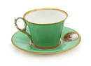 A Royal Worcester porcelain cup and saucer,