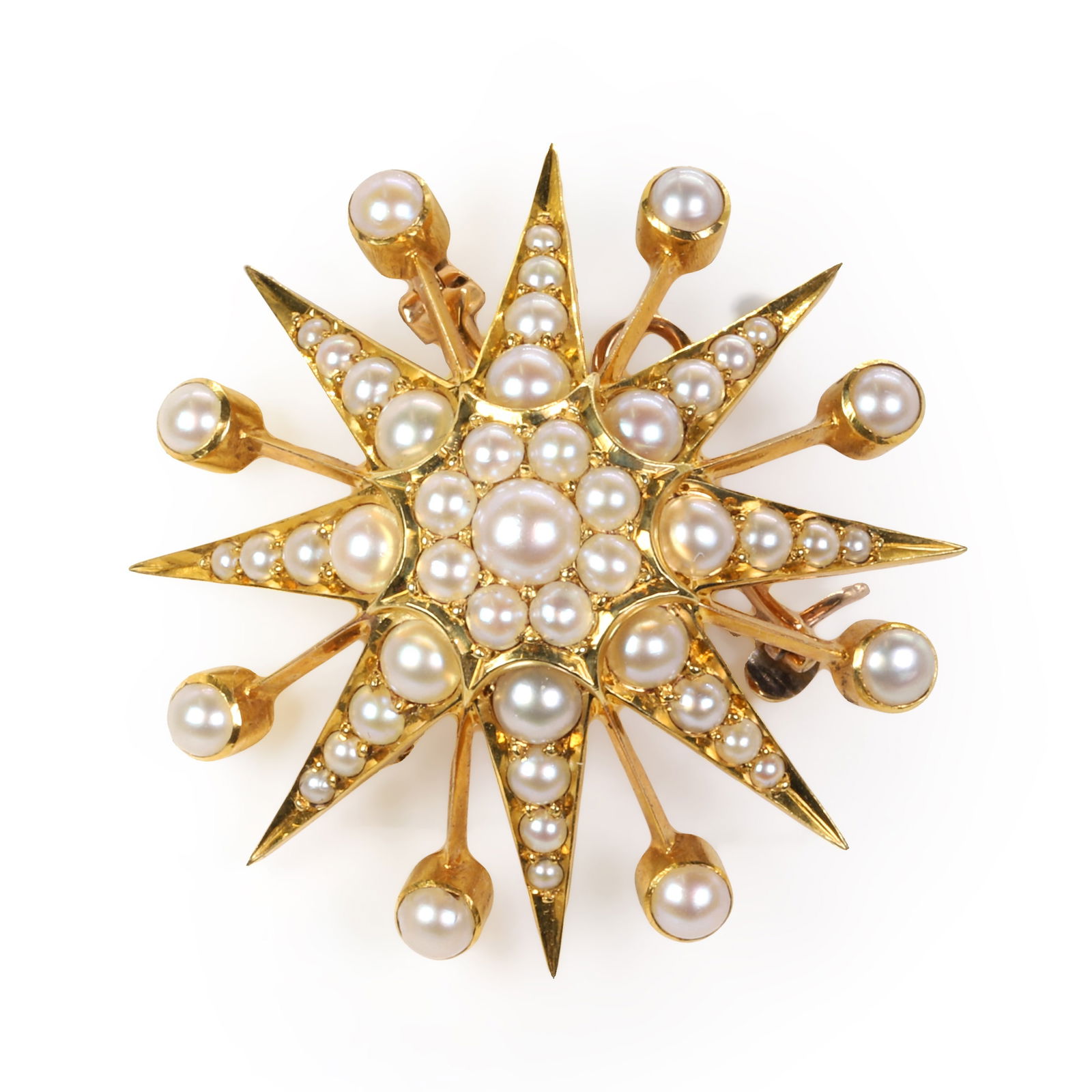 An Edwardian gold and pearl starburst brooch, (1 of 3)