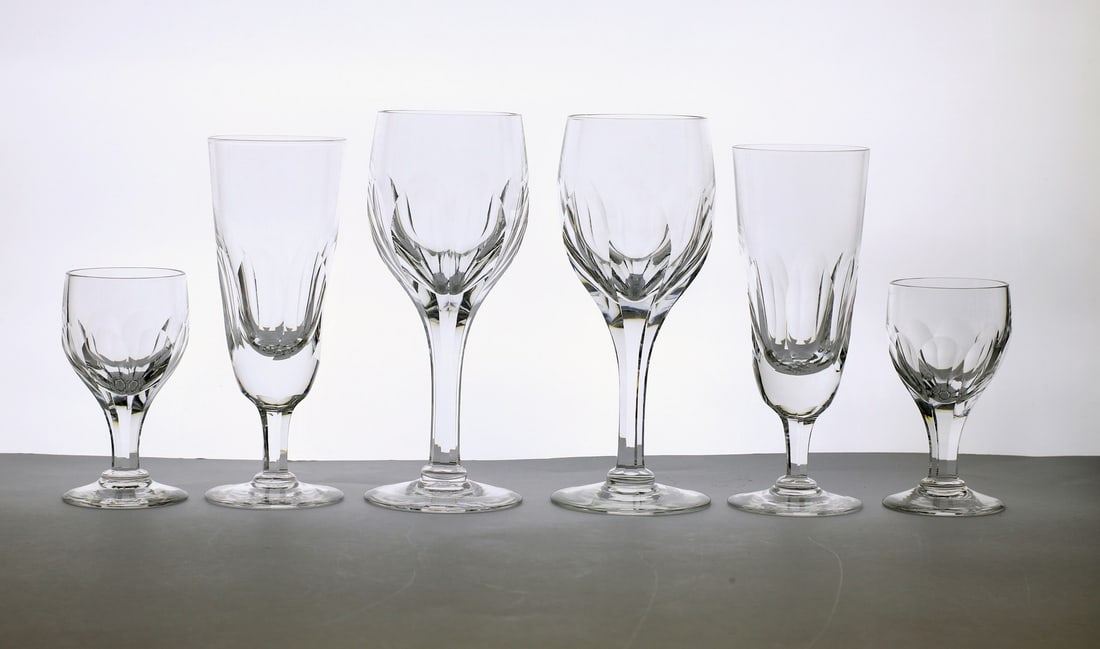 A part suite of Thomas Webb 'Royal Yacht' pattern glasses: A part suite of Thomas Webb 'Royal Yacht' pattern glasses comprising; twelve wine glasses, 18cm high eight sherry glasses, 10.5cm high and two champagne flutes, 17cm high (22) Condition Report: Chip t