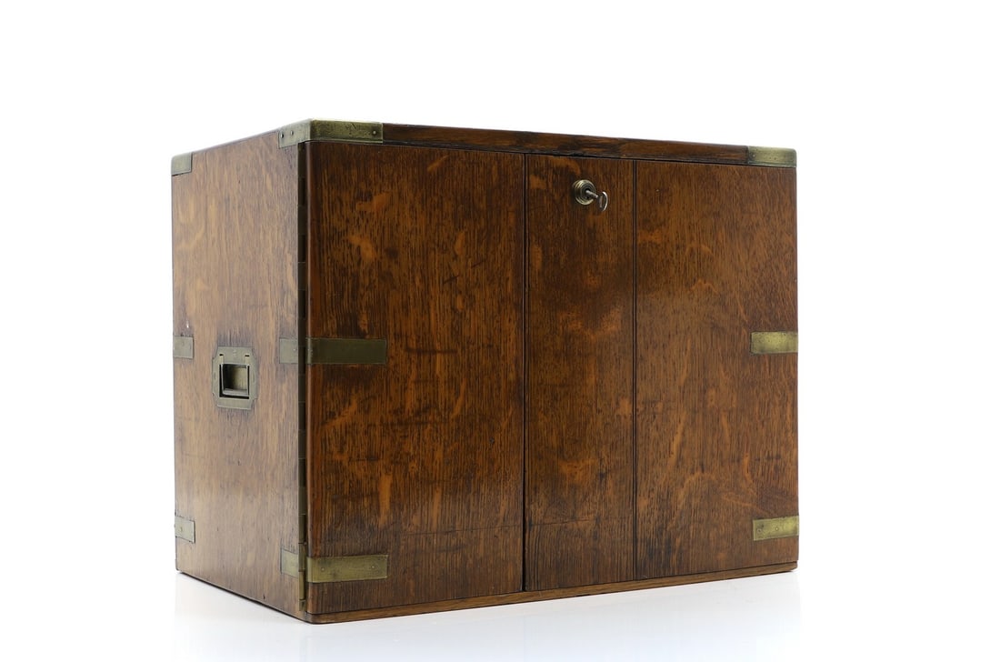 An oak and brass bound three-drawer cabinet, (1 of 5)