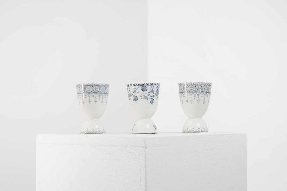 Three glazed earthenware egg cups, (1 of 6)