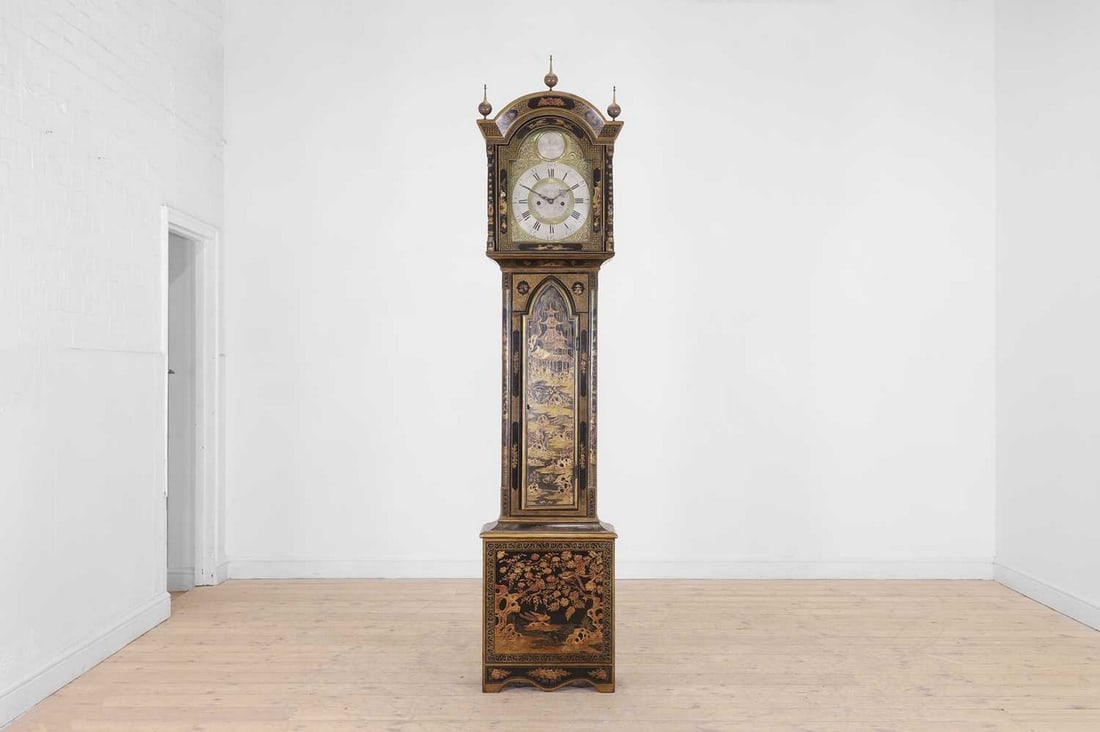 A George III-style black and gilt japanned longcase clock,: A George III-style black and gilt japanned longcase clock, early 20th century, the earlier twelve-inch dial inscribed 'John Walker, Newcastle', the eight-day movement with twin pillars striking on a b