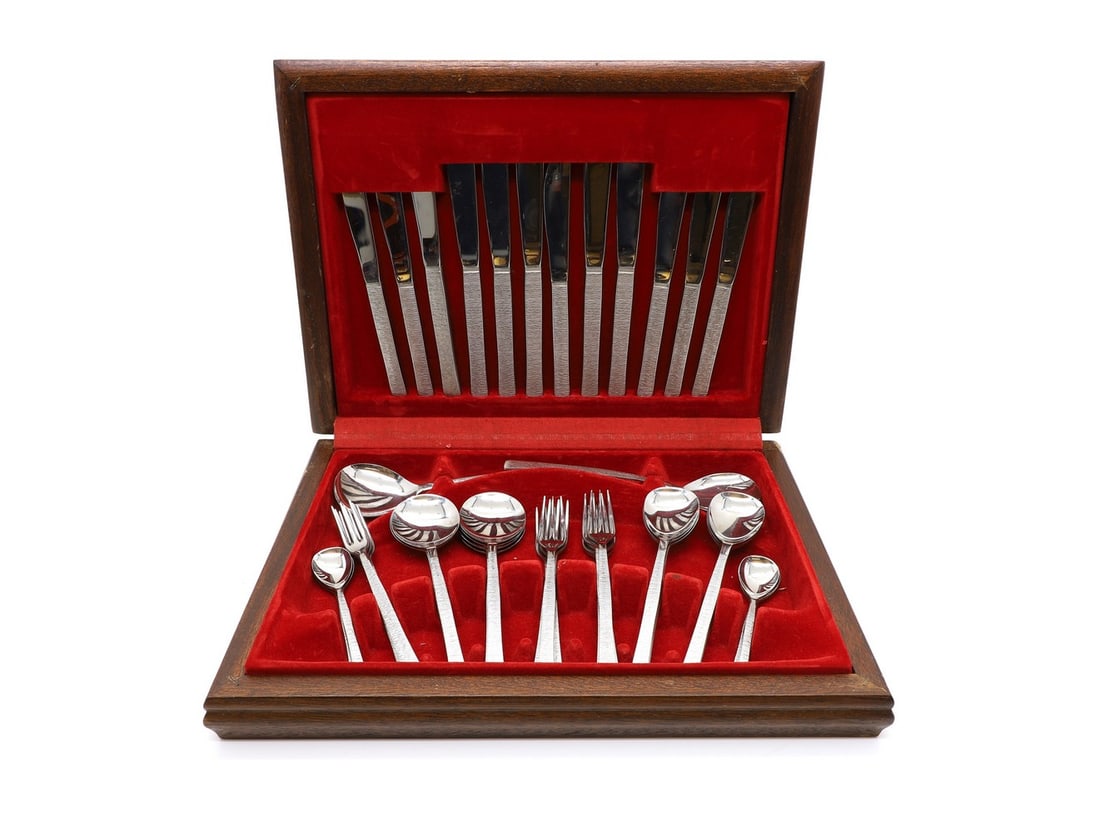 A canteen of Viners of Sheffield stainless steel cutlery,: A canteen of Viners of Sheffield stainless steel cutlery, designed by Gerald Benney, for six settings, in a fitted case Condition Report: Good overall condition. Case fair too.