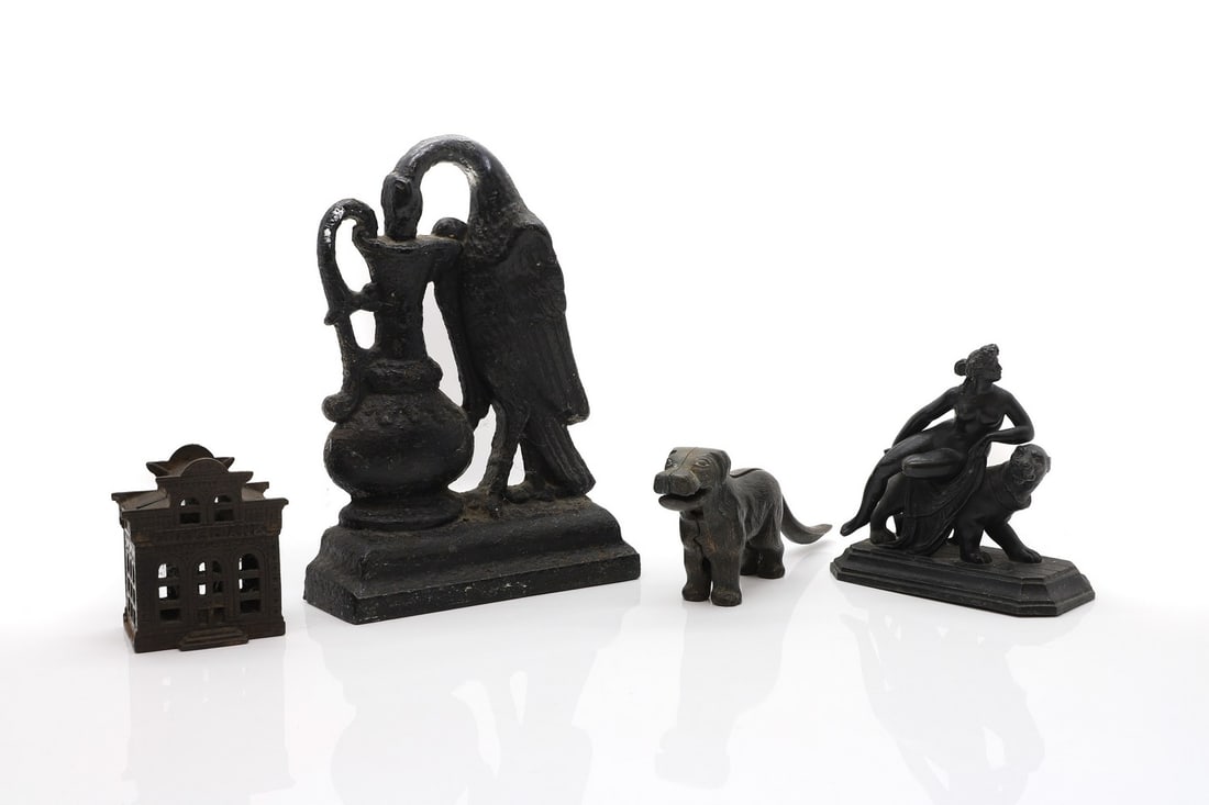 A cast iron City Bank money box, (1 of 2)