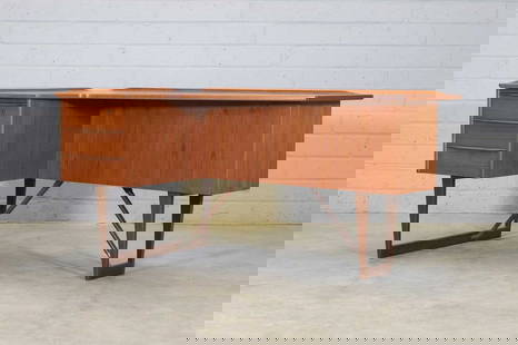 Peter Løvig Nielsen (Danish, 1929-2007),: Peter Løvig Nielsen (Danish, 1929-2007), 1960s, a 'Boomerang' desk, designed for Hedensted Møbelfabrik, the swept top over a single bank of three drawers to the left, to the front with a rec