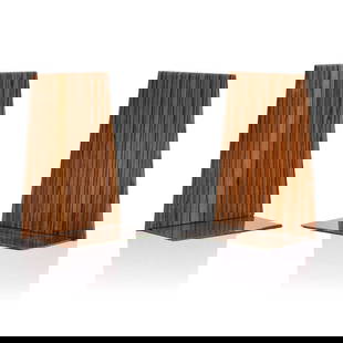 Kai Kristiansen (Danish, b.1951),: a pair of zebrawood bookends, 1960s, designed for Feldballes Møbelfabrik, each of trapezoid form, with a stainless steel base,10cm wide5cm deep14cm high (2)