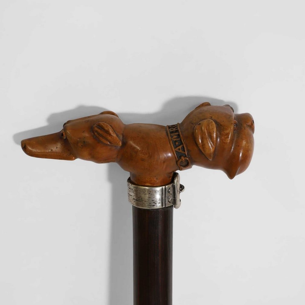 A rosewood and burrwood walking cane, (1 of 3)