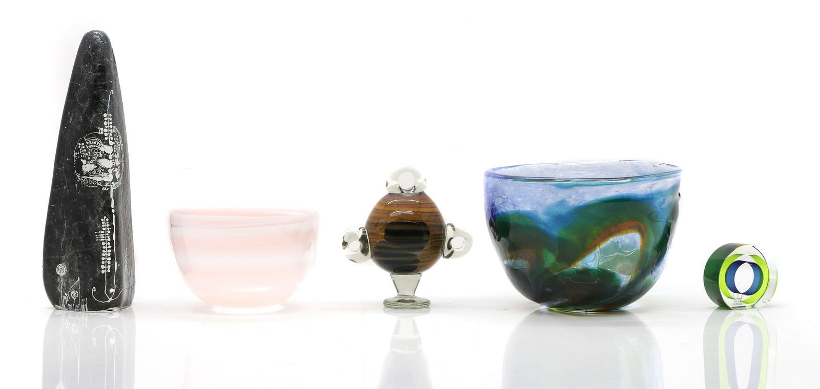A collection of Scandinavian glass items,: A collection of Scandinavian glass items, comprising a Kosta ‘Lapland’ obelisk, designed by Goran Warff, 24.9cm high, an Orrefors glass bowl, with pink and opal trailed 'pennellate' type d