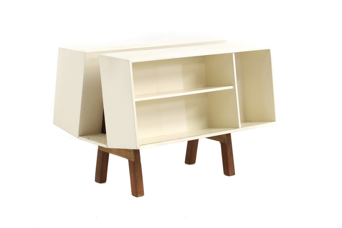 A Penguin 'Donkey Bookcase Mk II',: A Penguin 'Donkey Bookcase Mk II', designed by Ernest Race for Isokon Plus in 1963, 53cm wide 40cm deep 40cm high Condition Report: Dusty, over-sprayed, label preset. Cracks to the centre.