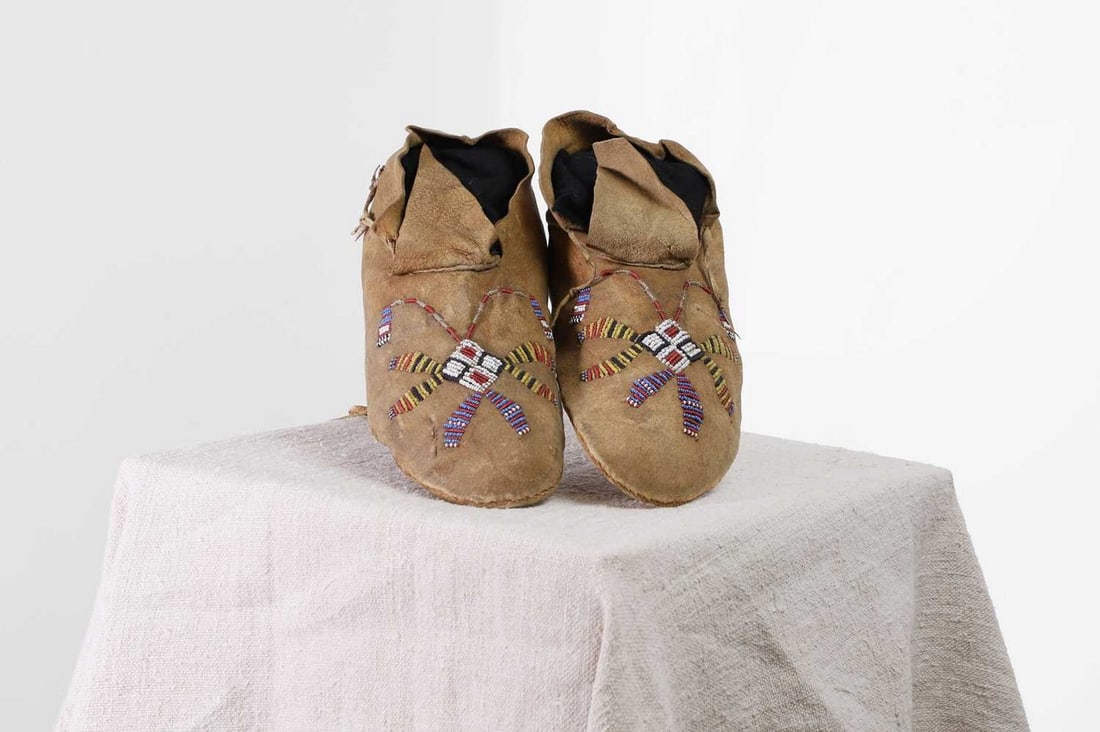 A pair of Native American beaded hide moccasins, (1 of 5)